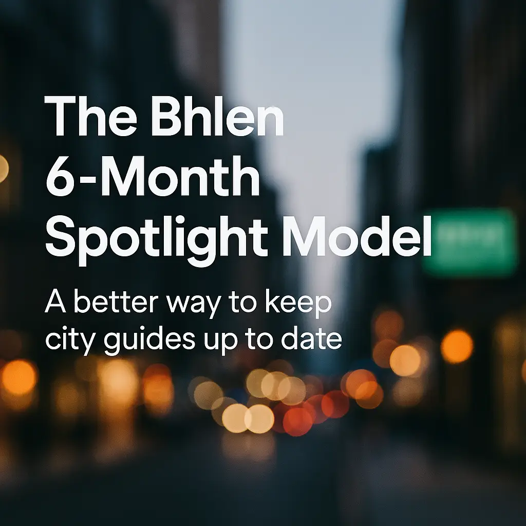 A blurred city street with warm lights in the background. Overlaid white text reads: “The Bhlen 6-Month Spotlight Model — A better way to keep city guides up to date.”